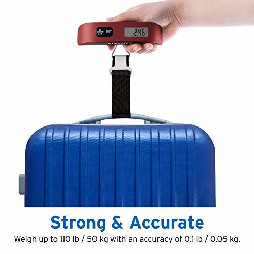 Digital luggage scale weighing a blue suitcase.