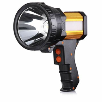 Handheld spotlight flashlight with black and orange design.