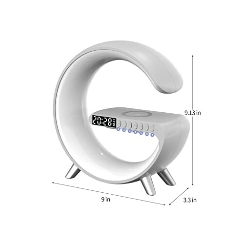 Modern digital clock with wireless charging and LED display.